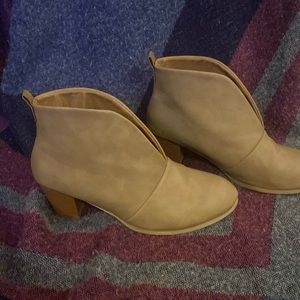 Brown ankle boot. New, worn only once. Fits size 9/9.5 US women’s measures at 41
